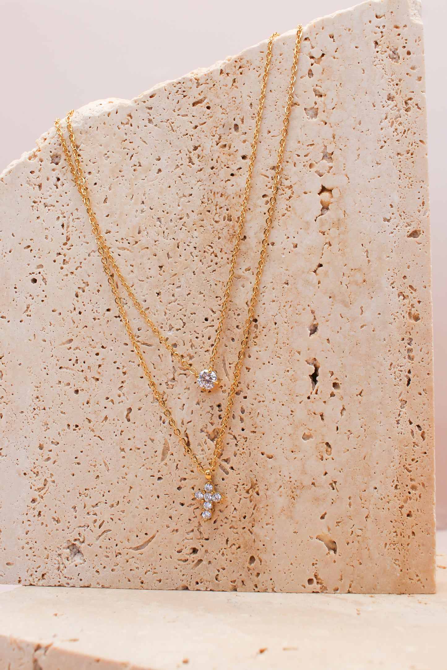 Collana doppia punto luce croce