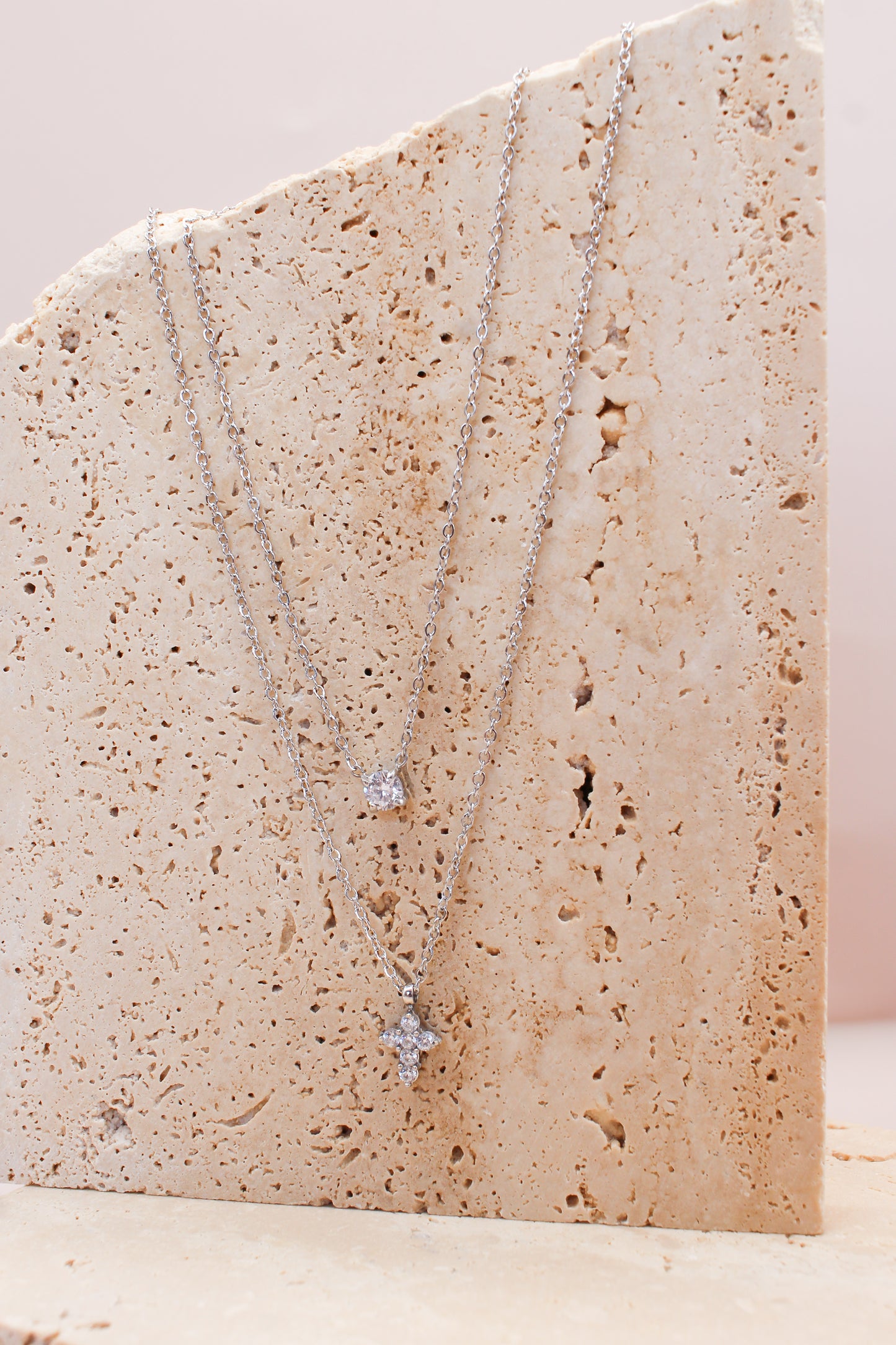 Collana doppia punto luce croce