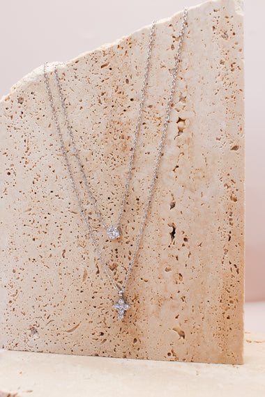 Collana doppia punto luce croce
