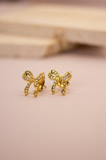 Orecchino mini fiocco in strass
