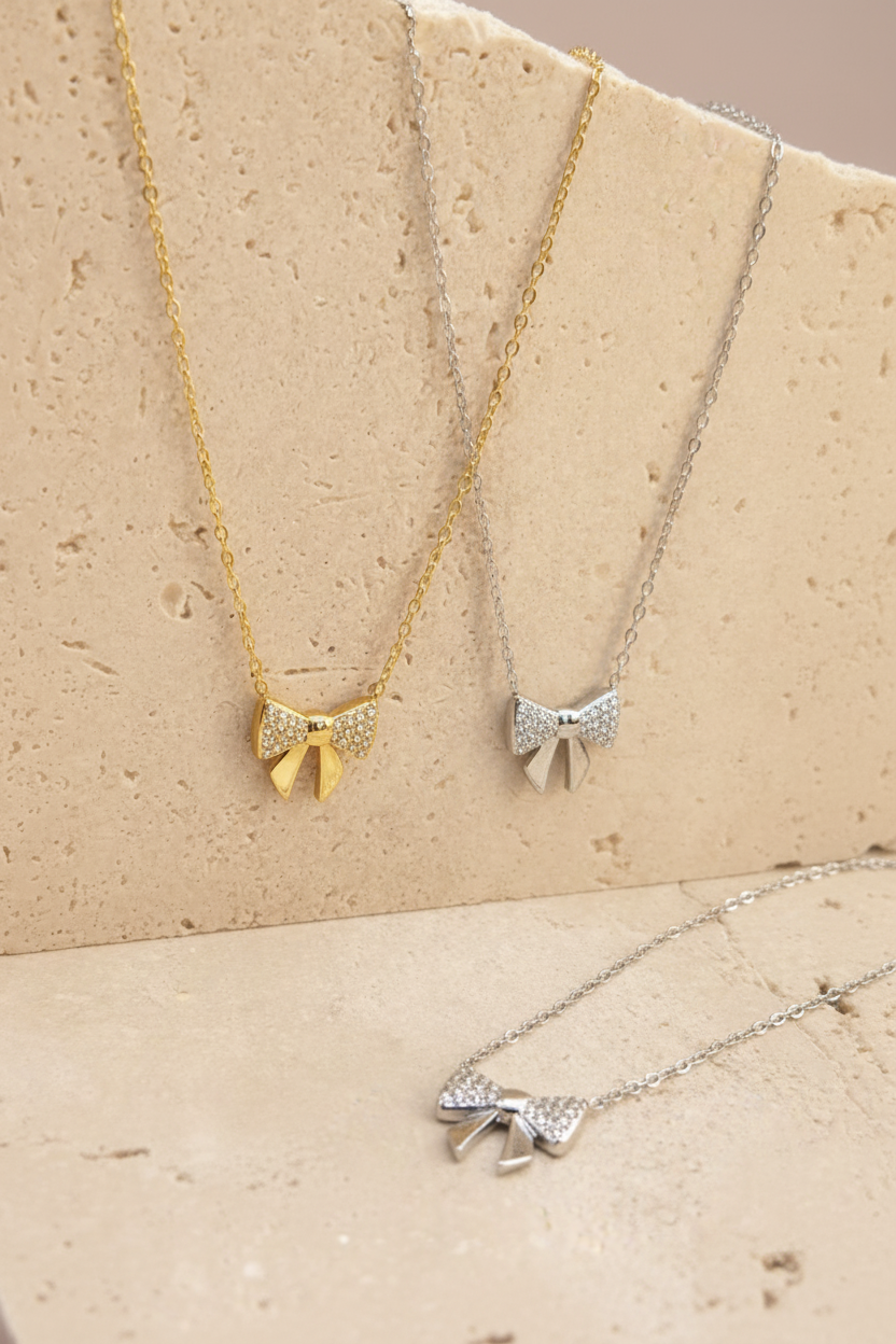 Collana fiocco oro e silver - luce migliorata