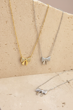 Collana fiocco oro e silver - luce migliorata
