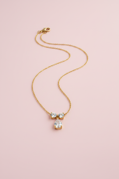 Collana pendente goccia crystal - sfondo rosa luminoso